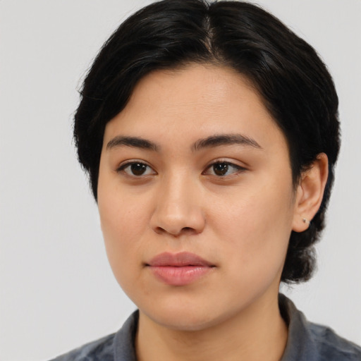 Neutral asian young-adult female with medium  black hair and brown eyes
