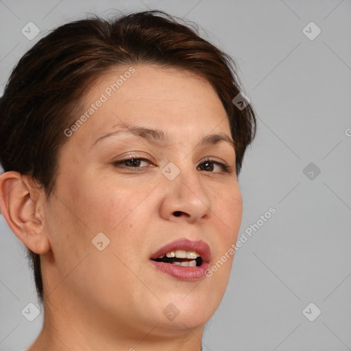 Joyful white adult female with medium  brown hair and brown eyes