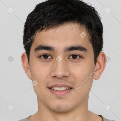 Joyful white young-adult male with short  black hair and brown eyes