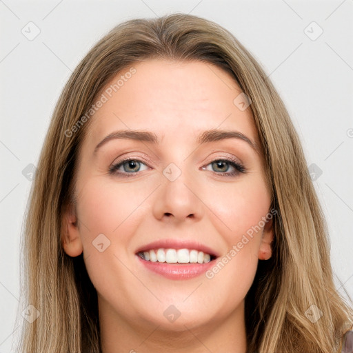 Joyful white young-adult female with long  brown hair and green eyes