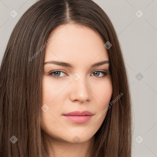 Neutral white young-adult female with long  brown hair and brown eyes