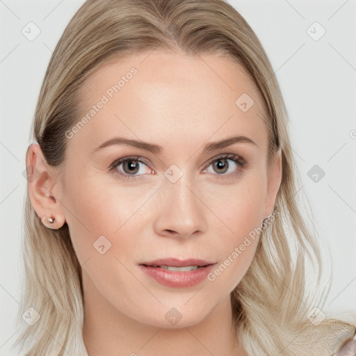 Joyful white young-adult female with long  brown hair and blue eyes