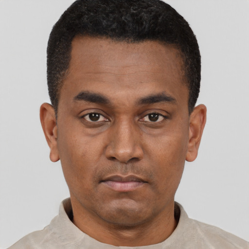 Neutral black young-adult male with short  black hair and brown eyes