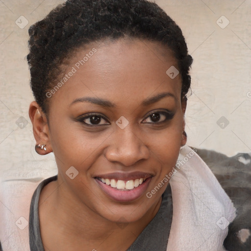 Joyful black young-adult female with short  brown hair and brown eyes