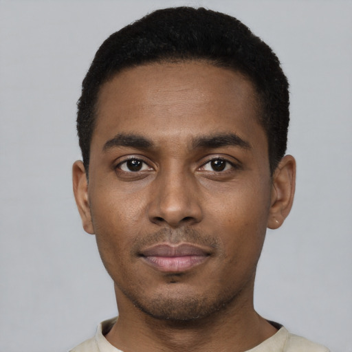 Neutral black young-adult male with short  black hair and brown eyes