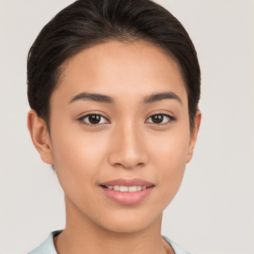 Joyful white young-adult female with short  brown hair and brown eyes