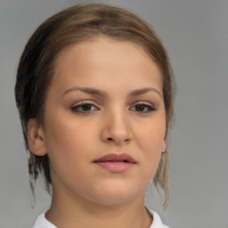 Neutral white young-adult female with medium  brown hair and brown eyes