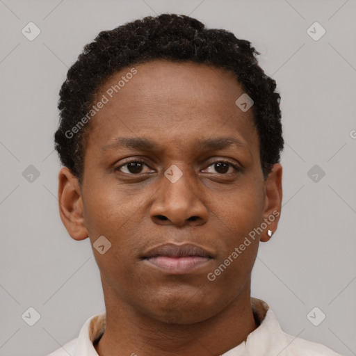 Neutral black young-adult female with short  brown hair and brown eyes