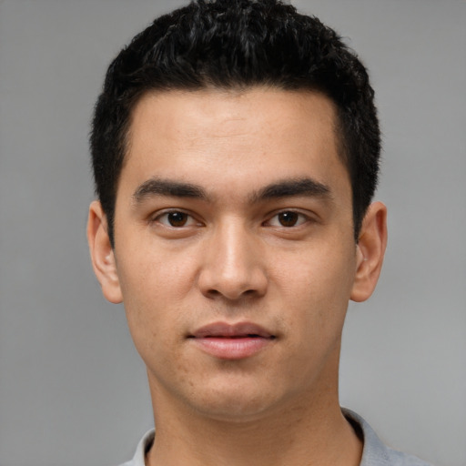 Neutral white young-adult male with short  black hair and brown eyes