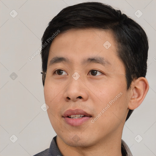 Neutral asian young-adult male with short  black hair and brown eyes