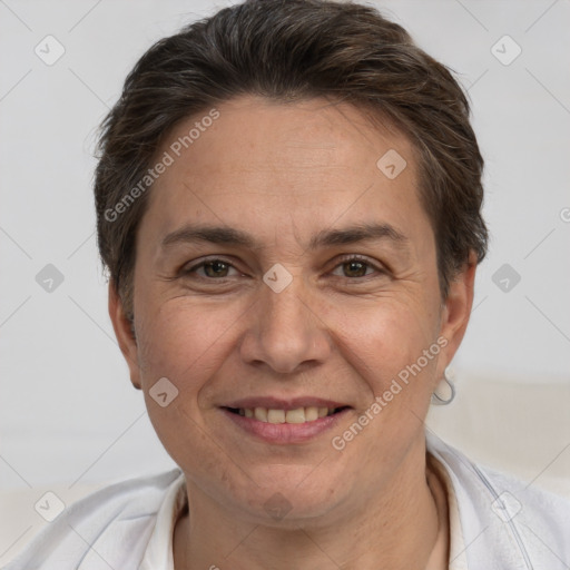 Joyful white adult female with short  brown hair and brown eyes