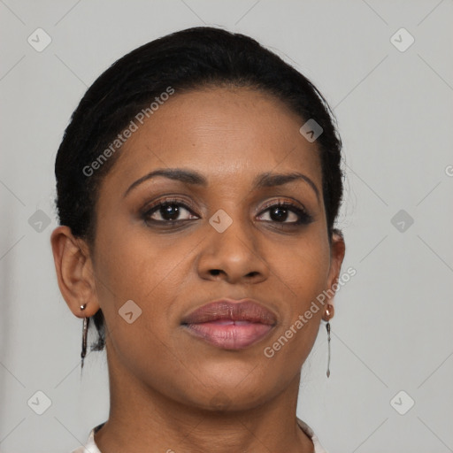 Joyful black young-adult female with short  brown hair and brown eyes