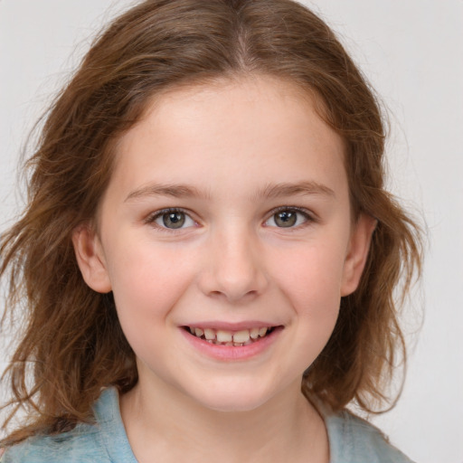 Joyful white child female with medium  brown hair and brown eyes