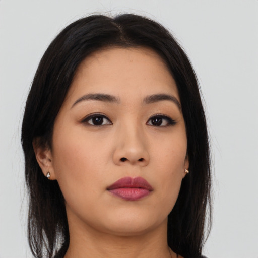 Neutral asian young-adult female with long  brown hair and brown eyes