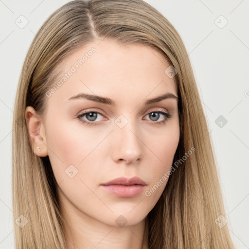 Neutral white young-adult female with long  brown hair and brown eyes