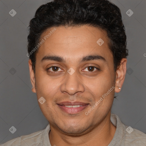 Joyful latino young-adult male with short  brown hair and brown eyes