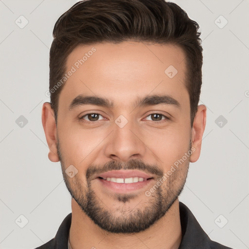 Joyful white young-adult male with short  brown hair and brown eyes