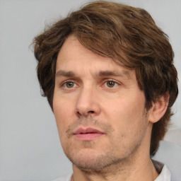 Neutral white adult male with short  brown hair and brown eyes