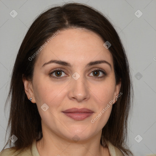 Joyful white adult female with medium  brown hair and brown eyes