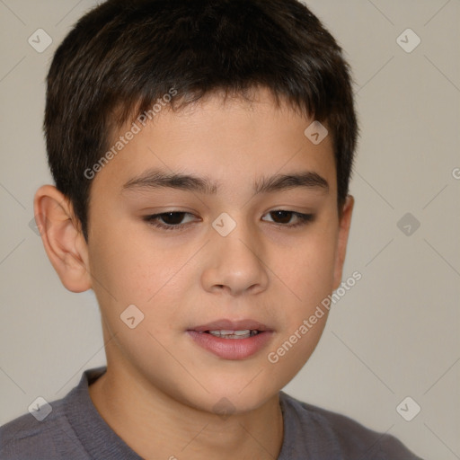 Joyful white child male with short  brown hair and brown eyes