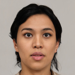 Neutral asian young-adult female with medium  black hair and brown eyes