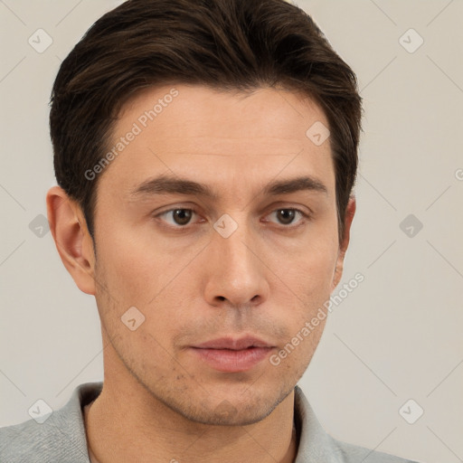 Neutral white young-adult male with short  brown hair and brown eyes