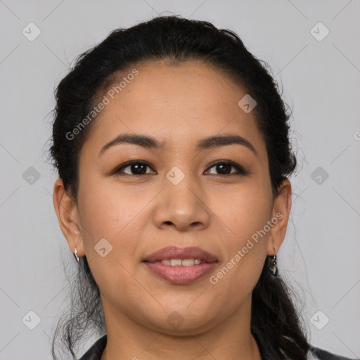 Joyful latino young-adult female with medium  brown hair and brown eyes