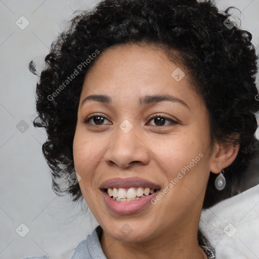 Joyful black young-adult female with medium  brown hair and brown eyes