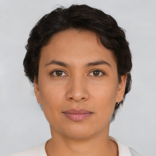Neutral latino young-adult female with short  brown hair and brown eyes