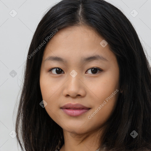 Joyful asian young-adult female with long  brown hair and brown eyes