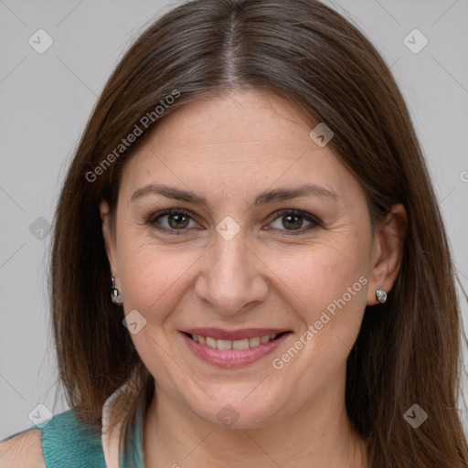 Joyful white young-adult female with long  brown hair and grey eyes