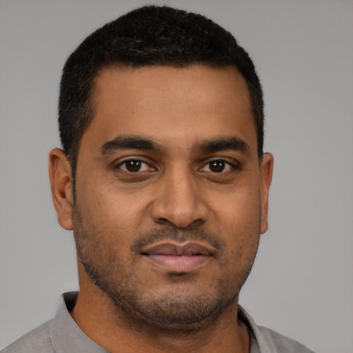 Neutral black young-adult male with short  brown hair and brown eyes