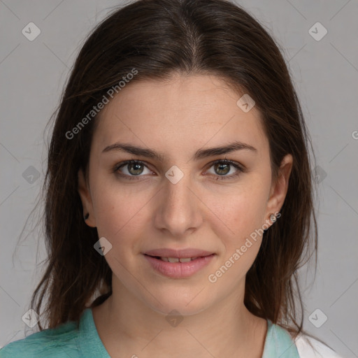 Joyful white young-adult female with medium  brown hair and grey eyes