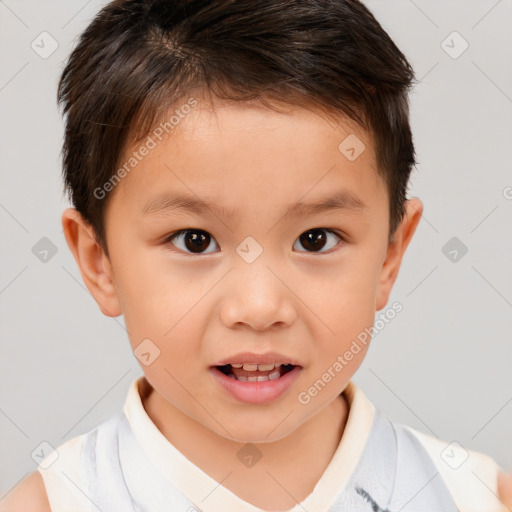 Joyful white child male with short  brown hair and brown eyes