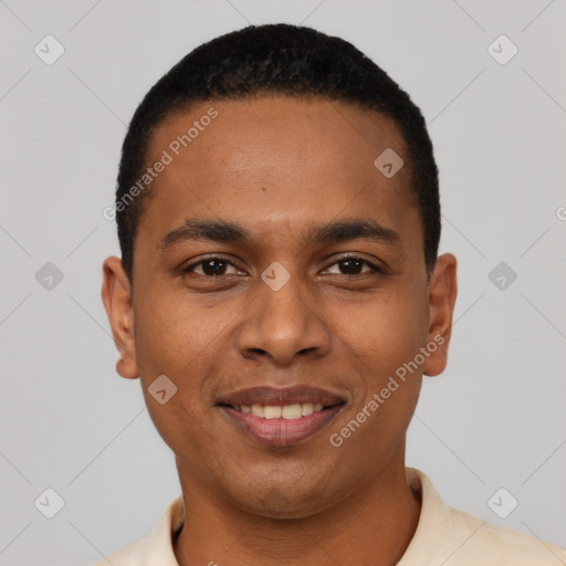 Joyful black young-adult male with short  black hair and brown eyes