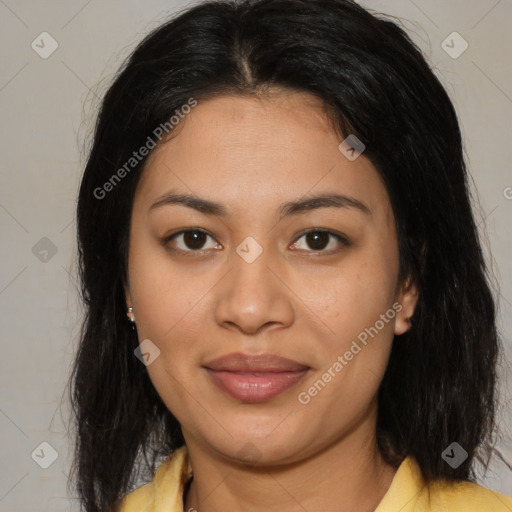 Joyful latino young-adult female with medium  brown hair and brown eyes