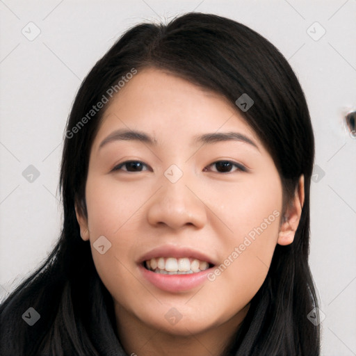 Joyful white young-adult female with long  black hair and brown eyes