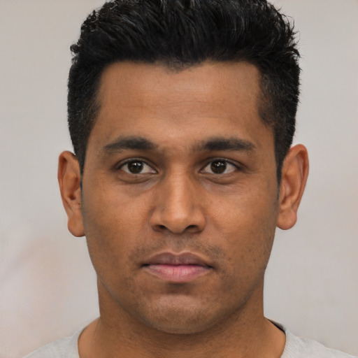 Neutral latino young-adult male with short  black hair and brown eyes