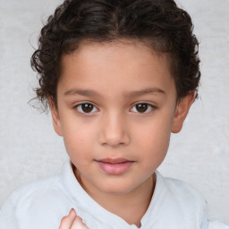 Joyful white child female with short  brown hair and brown eyes