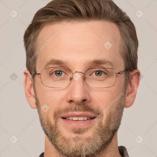 Joyful white adult male with short  brown hair and grey eyes