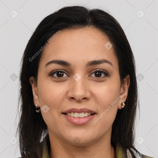 Joyful latino young-adult female with long  brown hair and brown eyes