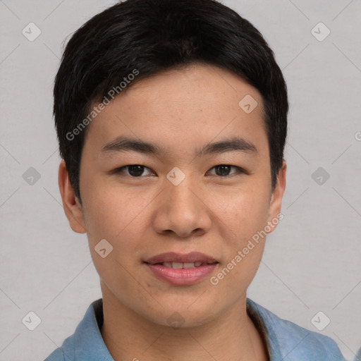 Joyful asian young-adult male with short  black hair and brown eyes