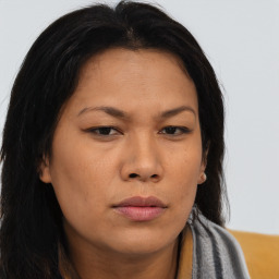 Neutral asian young-adult female with long  brown hair and brown eyes