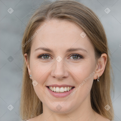 Joyful white young-adult female with medium  brown hair and grey eyes