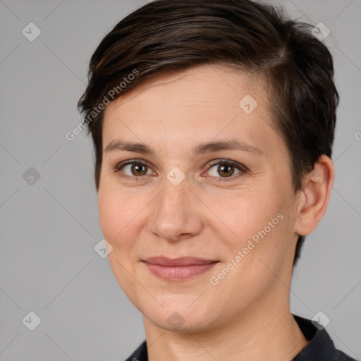 Joyful white adult female with short  brown hair and brown eyes