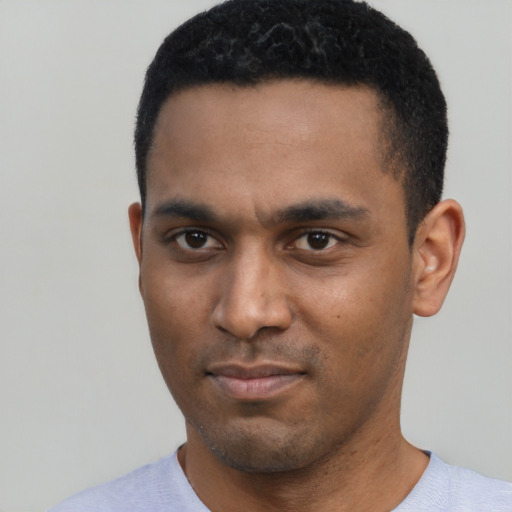Neutral black young-adult male with short  black hair and brown eyes
