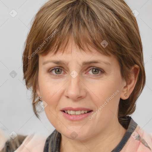 Joyful white adult female with medium  brown hair and grey eyes