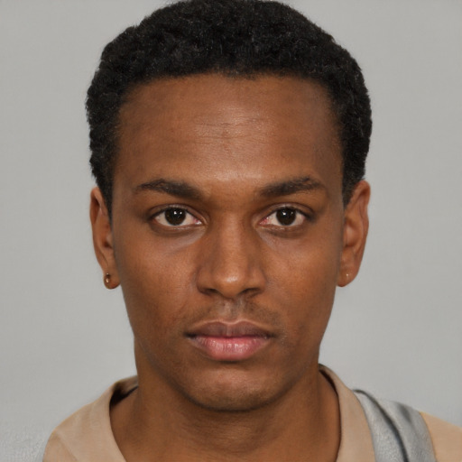 Neutral black young-adult male with short  black hair and brown eyes
