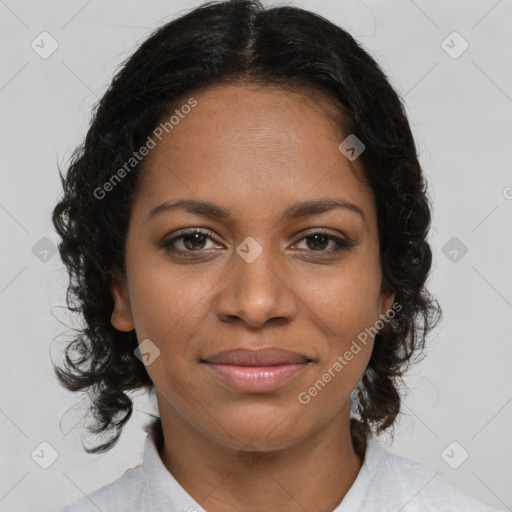 Joyful black young-adult female with medium  brown hair and brown eyes