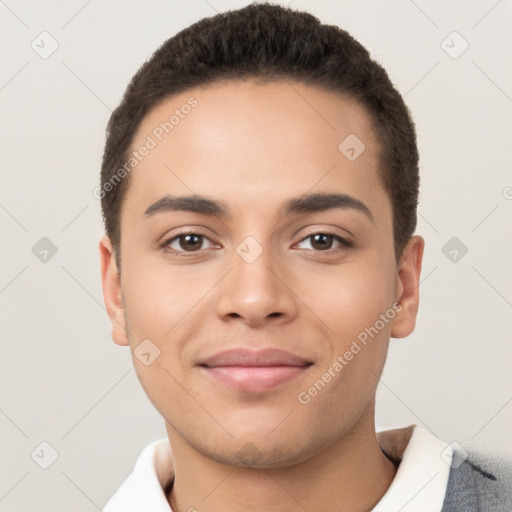 Joyful white young-adult male with short  black hair and brown eyes